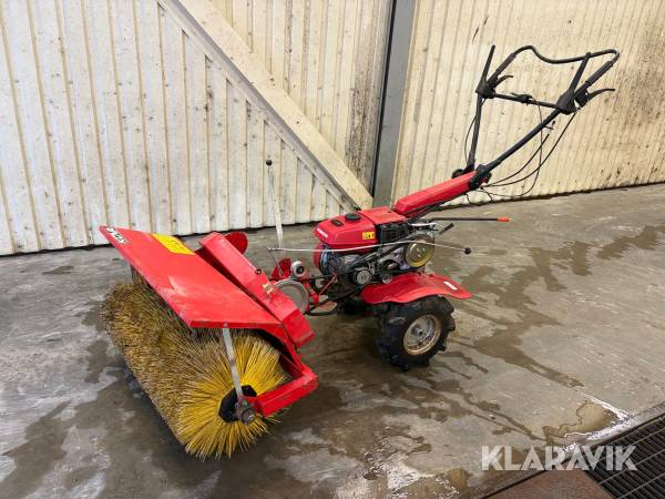 Redskapsbärare Honda med sopvals