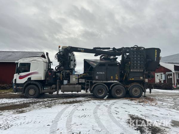 Flishugg Kesla 1060 på Scania 124G